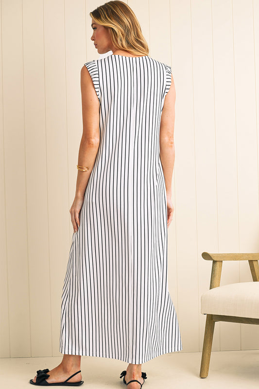 Effortlessly chic, this black and white striped maxi vest dress is perfect for casual outings or beach days. The sleeveless design, round neck, and classic stripes create a timeless, stylish look. Made from high-quality, lightweight fabric, it offers durability, comfort, and easy care. The maxi length and relaxed fit provide a flattering silhouette for various body types.